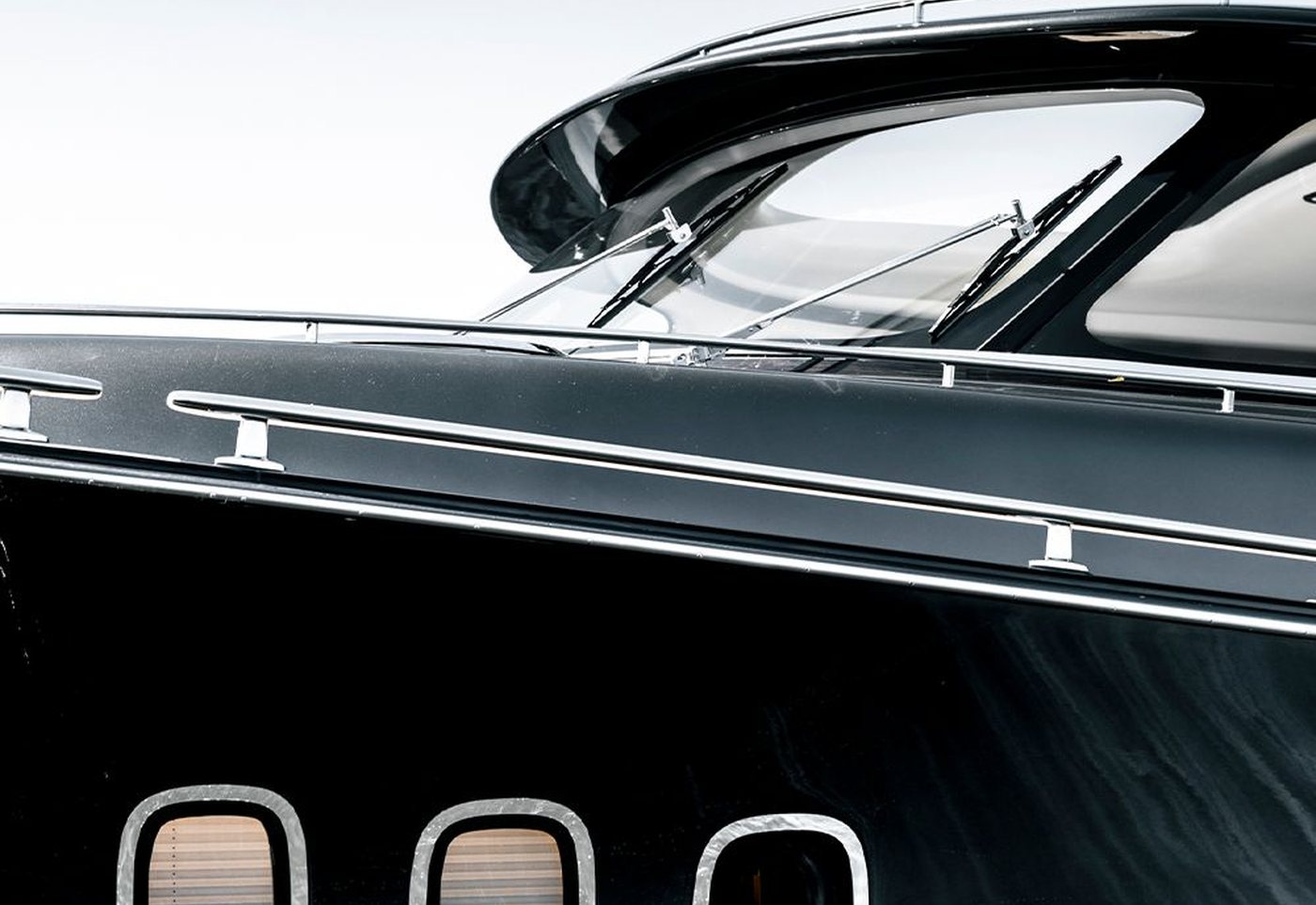 Corrected black gelcoat and restored stainless rail on a vessel at DSTNCT WERKS